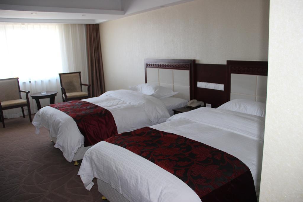 Dalian Southern Airline Pearl Hotel Kamer foto
