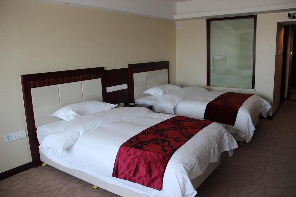 Dalian Southern Airline Pearl Hotel Kamer foto